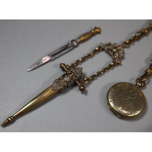 150 - 19th century ladies' brass chatelaine with five appendages to include: thimble holder with thimble, ... 