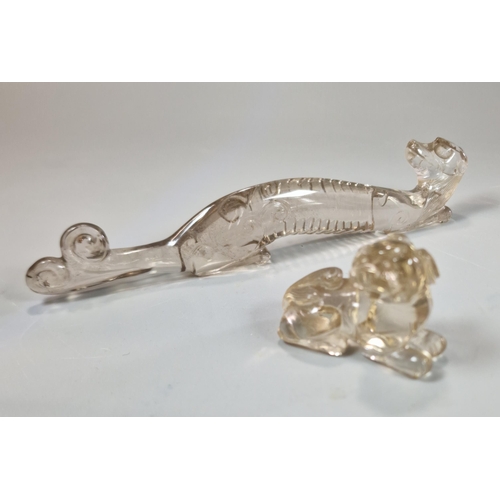 155 - Two carved Rock Crystal figures to include: a recumbent Chilong Dragon together with a mythical dog.... 