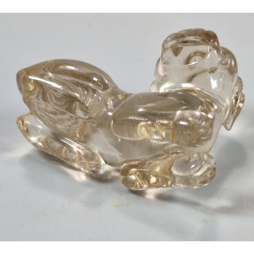 155 - Two carved Rock Crystal figures to include: a recumbent Chilong Dragon together with a mythical dog.... 