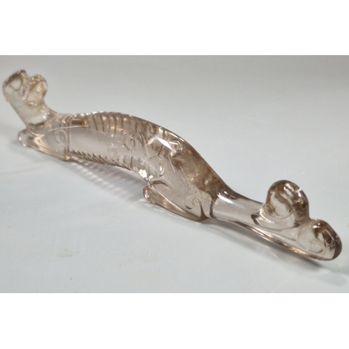 155 - Two carved Rock Crystal figures to include: a recumbent Chilong Dragon together with a mythical dog.... 