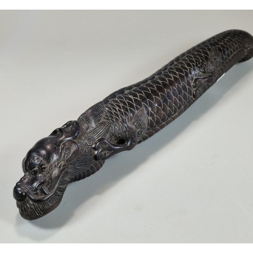 158 - Carved dark hardwood study of a three toed Dragon, intricately carved. Probably Japanese. 26cm long ... 