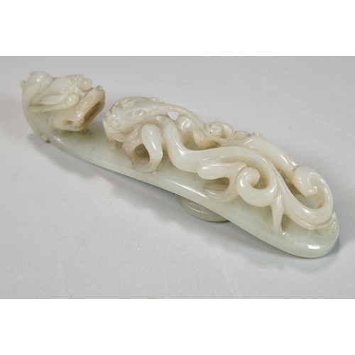 159 - Two finely carved Chinese Dragon and Chilong green and white hardstone belt hooks, each with the dra... 