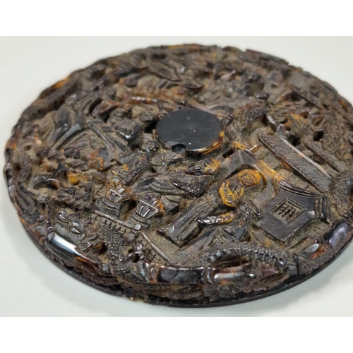 160 - Chinese export ornately and deeply carved tortoiseshell box of circular form depicting multiple figu... 