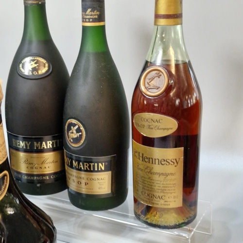 165 - Collection of Cognac to include: Remy Martin 68cl, Martell Medallion Liqueur Cognac, Hennessy Cognac... 