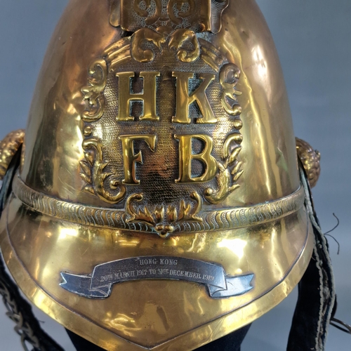 174 - Brass Merryweather Pattern Fireman's Helmet for the 'Hong Kong Fire Brigade'. Of typical form with r... 