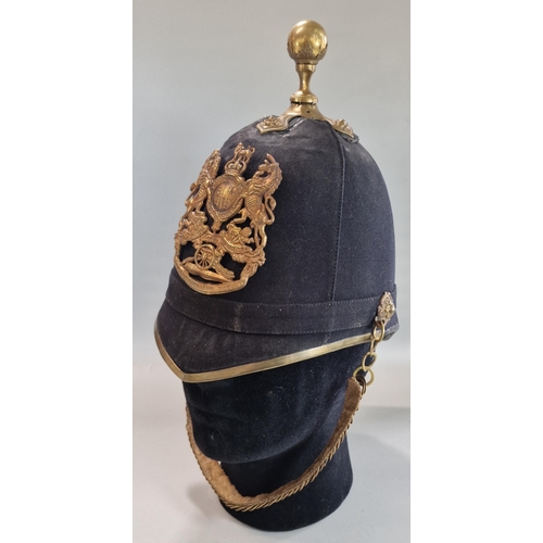 182 - British Royal Artillery blue cloth helmet, with the frontal plate of the Royal Arms pattern with can... 