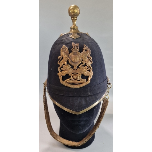 182 - British Royal Artillery blue cloth helmet, with the frontal plate of the Royal Arms pattern with can... 