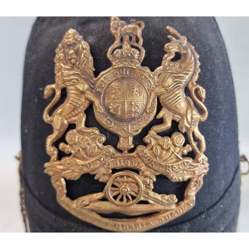 182 - British Royal Artillery blue cloth helmet, with the frontal plate of the Royal Arms pattern with can... 