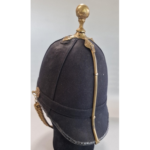 182 - British Royal Artillery blue cloth helmet, with the frontal plate of the Royal Arms pattern with can... 