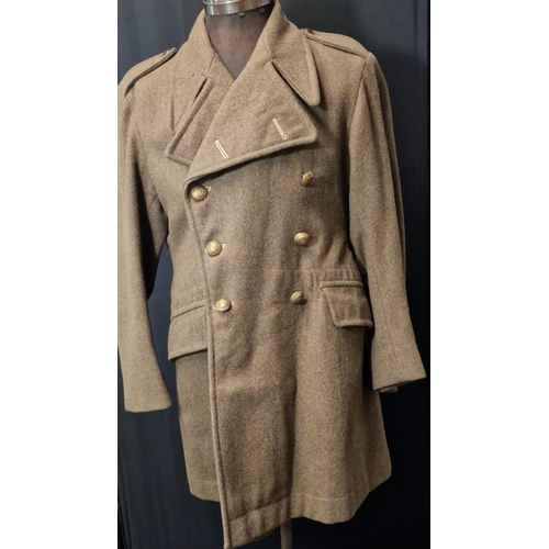 186 - British Army Great Coat, 1951 pattern, dated 1952, Size 5, with George VI Royal Engineers buttons.
C... 