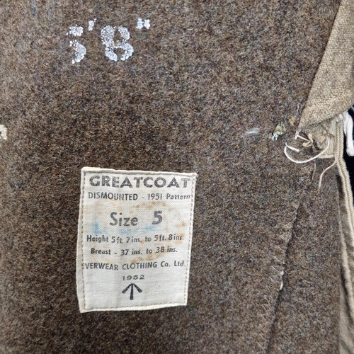 186 - British Army Great Coat, 1951 pattern, dated 1952, Size 5, with George VI Royal Engineers buttons.
C... 