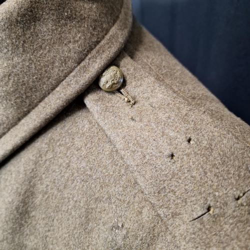 187 - British Army WW1 style greatcoat, heavy khaki wool with two lower pockets, soldier name stamped to t... 