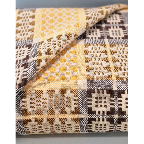 188 - Vintage beige ground Welsh geometric carthen in tones of browns and yellow. 245x230cm approx. (B.P. ... 