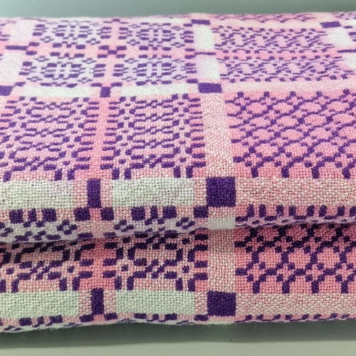 191 - Vintage Welsh pink and purple geometric carthen. 225x205cm approx. (B.P. 21% + VAT)