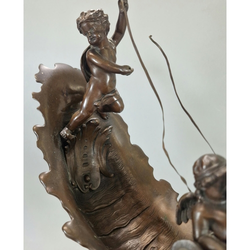 192 - After Emile Louis Picault, a late 19th century French Bronze centre piece of two winged cherubs with... 