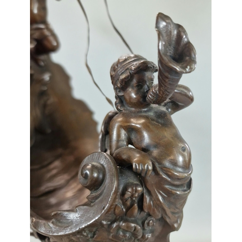 192 - After Emile Louis Picault, a late 19th century French Bronze centre piece of two winged cherubs with... 