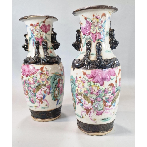 202 - Pair of Chinese porcelain crackle glaze Warrior vases with polychrome panels of horse-men and foot s... 