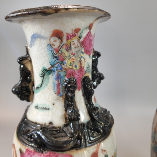 202 - Pair of Chinese porcelain crackle glaze Warrior vases with polychrome panels of horse-men and foot s... 