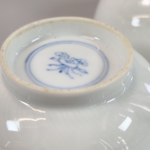 204 - Pair of Chinese porcelain small bowls, moulded as flowerheads with four iron red enamel hand-painted... 