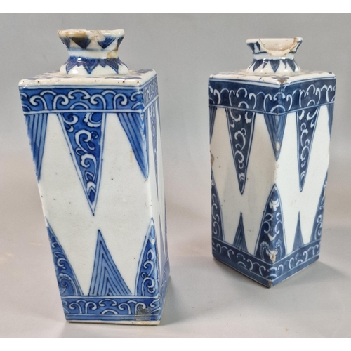 205 - Near pair of Oriental porcelain blue and white square section bottles, possibly Japanese Tokkuri Sak... 