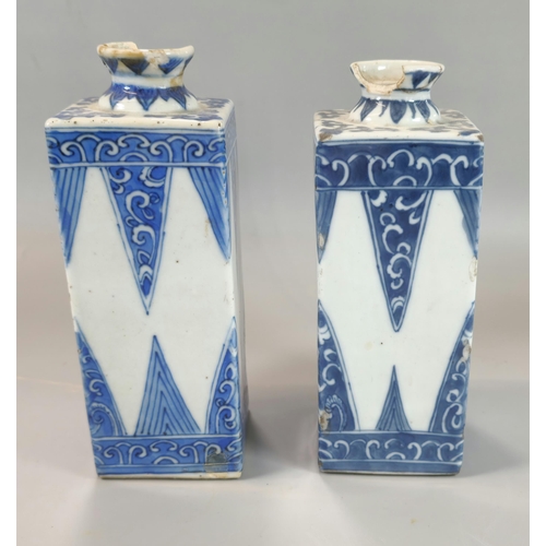 205 - Near pair of Oriental porcelain blue and white square section bottles, possibly Japanese Tokkuri Sak... 