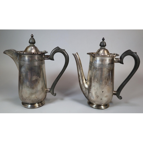 22 - George V silver coffee pot with engraved initials, together with a matching George V silver water ju... 