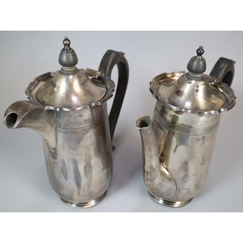 22 - George V silver coffee pot with engraved initials, together with a matching George V silver water ju... 