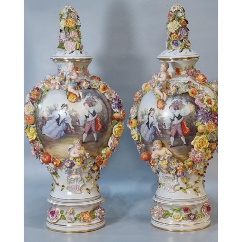 224 - Pair of modern Carl Thieme Potschapel twin handled vases and pierced covers with floral encrusted de... 