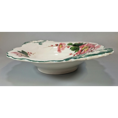 230 - Llanelly Pottery, Shufflebotham decorated elliptical bowl painted with wild roses and sponged decora... 