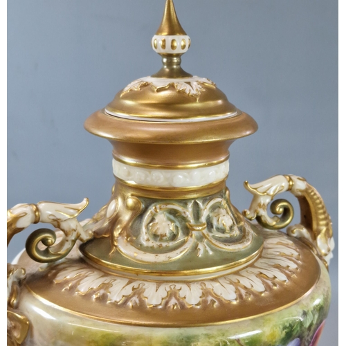 235 - Royal Worcester pedestal urn shaped two handled vase, hand-painted with fruits on a mossy background... 