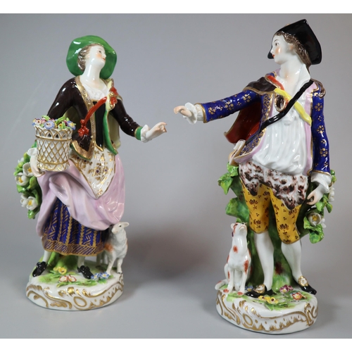 245 - Pair of 20th century continental porcelain figurines in 18th century outfits of a man and a lady as ... 