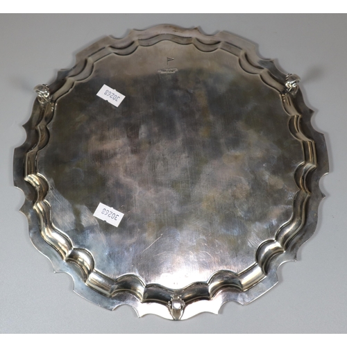 29 - George V silver piecrust salver raised on three scroll feet.  By Walker and Hall, Sheffield 1931. 26... 