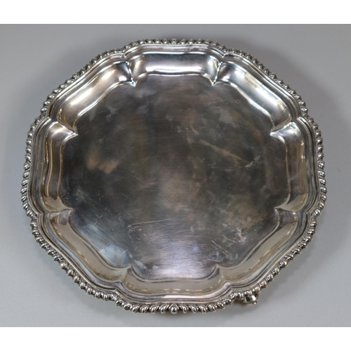 30 - George V silver salver, having gadroon edge and raised on three scroll feet, by S.B.&S. Ltd., Cheste... 