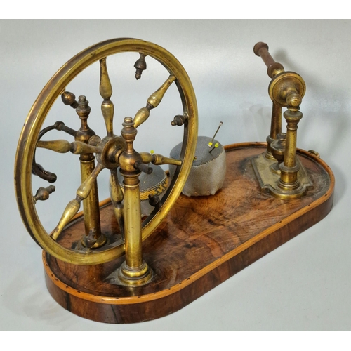 325 - 18th century gilt brass and steel lacemaker's yarn winder on beaded wooden base. (B.P. 21% + VAT)