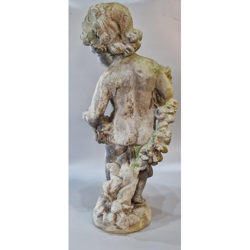 326 - Antiqued and weathered lead garden sculpture of a nude cherub with flowers on a naturalistic base. 7... 