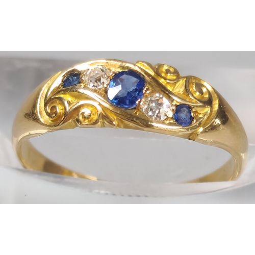 50 - Edwardian 18ct gold diamond and sapphire five stone ring of scroll form. Birmingham hallmarks. 2.6g ... 