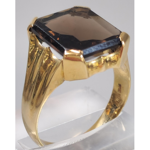 51 - 14ct gold and smokey quartz signet ring. 8.6g approx. Size U. (B.P. 21% + VAT)