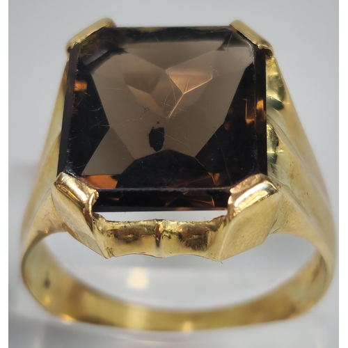 51 - 14ct gold and smokey quartz signet ring. 8.6g approx. Size U. (B.P. 21% + VAT)