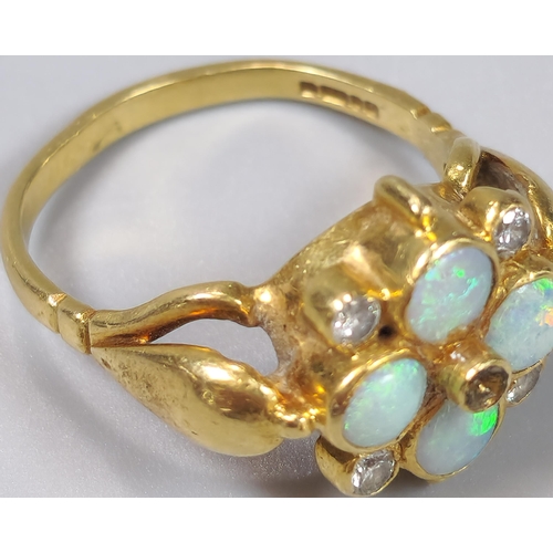 52 - 18ct gold flowerhead ring inset with four diamonds and four opals (missing one diamond). 5g approx. ... 