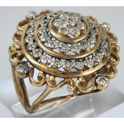 66 - 9ct gold Art Deco style multi-cluster diamond bullseye ring. 8.4g approx. Size M. (B.P. 21% + VAT)