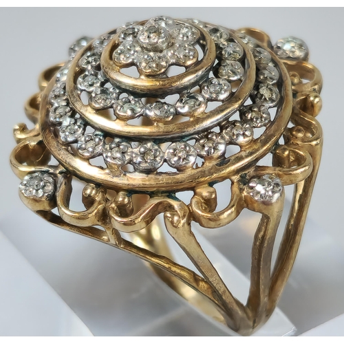 66 - 9ct gold Art Deco style multi-cluster diamond bullseye ring. 8.4g approx. Size M. (B.P. 21% + VAT)