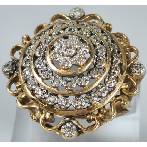 66 - 9ct gold Art Deco style multi-cluster diamond bullseye ring. 8.4g approx. Size M. (B.P. 21% + VAT)