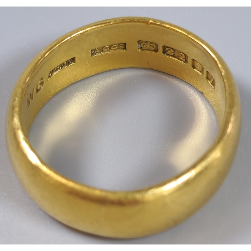 67 - 22ct gold wedding band. 9.5g approx. Size O1/2. (B.P. 21% + VAT)