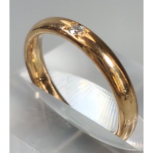 69 - 18ct Clogau Gold wedding band inset with tiny diamond chip. 3.9g approx. Size L. (B.P. 21% + VAT)