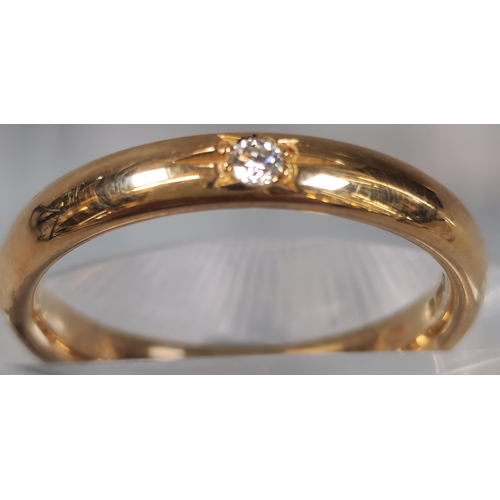 69 - 18ct Clogau Gold wedding band inset with tiny diamond chip. 3.9g approx. Size L. (B.P. 21% + VAT)