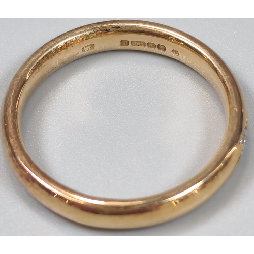 69 - 18ct Clogau Gold wedding band inset with tiny diamond chip. 3.9g approx. Size L. (B.P. 21% + VAT)