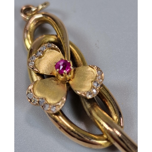 73 - 15ct gold diamond and ruby clover pendant. 3.1g approx. 4cm long approx. (B.P. 21% + VAT)