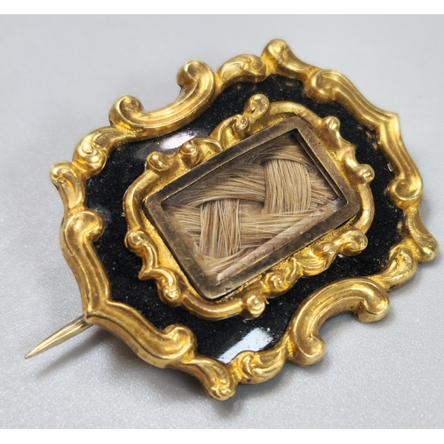 76 - Two gold Mourning brooches, one with inscription 'Mrs Elizal Davis, dated 1883', together with a gol... 