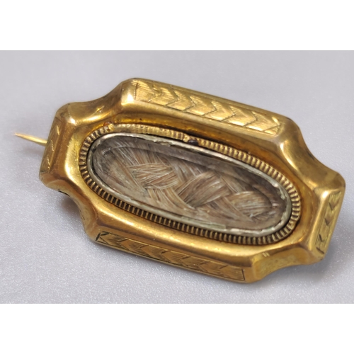 76 - Two gold Mourning brooches, one with inscription 'Mrs Elizal Davis, dated 1883', together with a gol... 