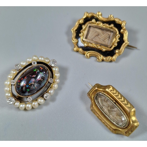 76 - Two gold Mourning brooches, one with inscription 'Mrs Elizal Davis, dated 1883', together with a gol... 